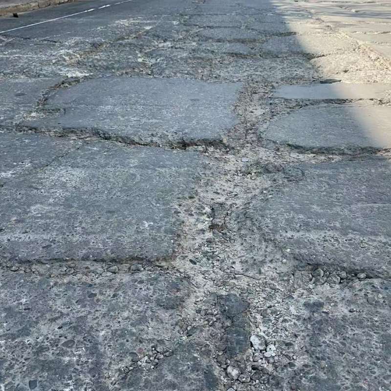 建昌路面起砂露石子修补料